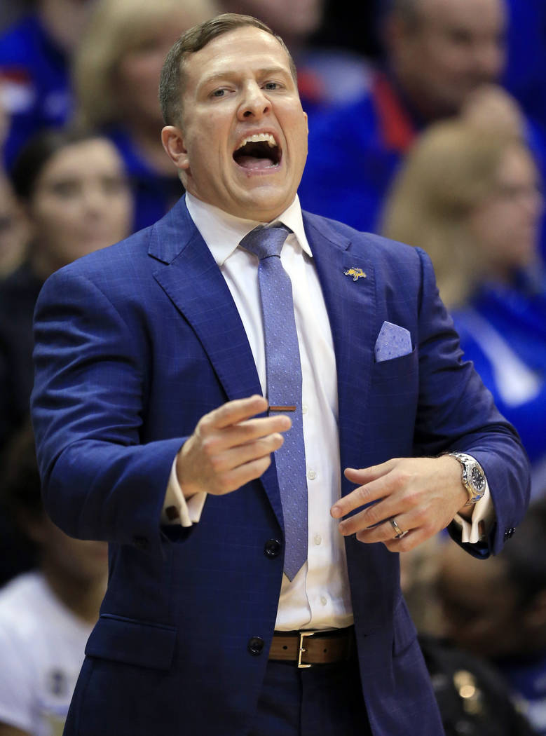 South Dakota State coach T.J. Otzelberger shouts to his team during the first half of an NCAA c ...