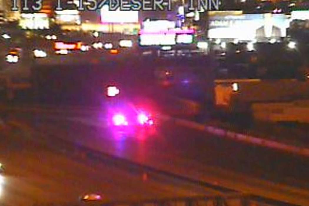 The northbound I-15 is blocked near the Spring Mountain Road exit early Thursday. March 28, 201 ...