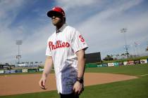 Bryce Harper walks on the field after being introduced as a Philadelphia Phillies player during ...