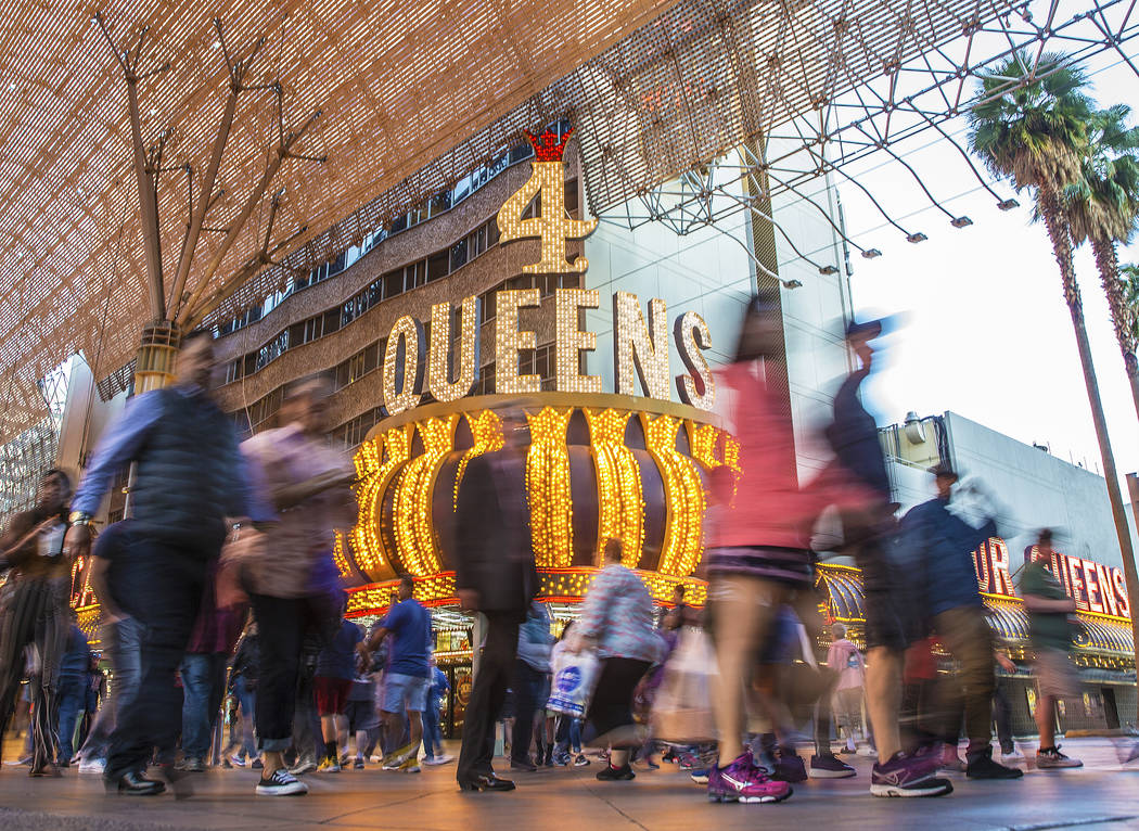Fremont Street is packed with visitors on Thursday, March 28, 2019, in Las Vegas. (Benjamin Hag ...