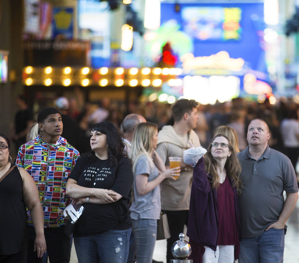 Fremont Street is packed with visitors on Thursday, March 28, 2019, in Las Vegas. (Benjamin Hag ...
