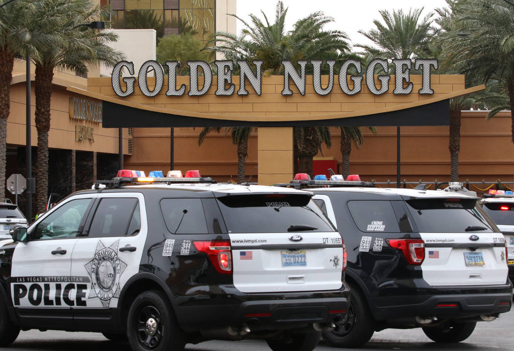 Las Vegas police investigate after a pursuit related to an officer-involved shooting ended at t ...