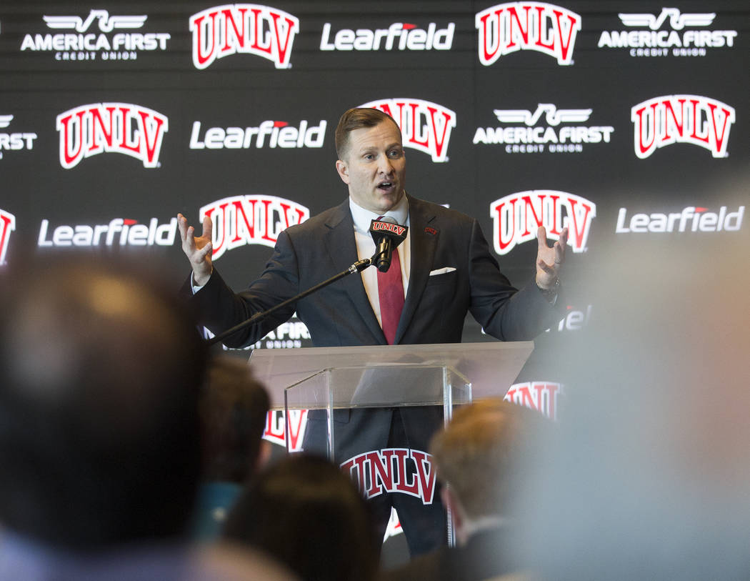 New UNLV men's basketball coach T.J. Otzelberger addresses the crowd at the Strip View Pavilion ...