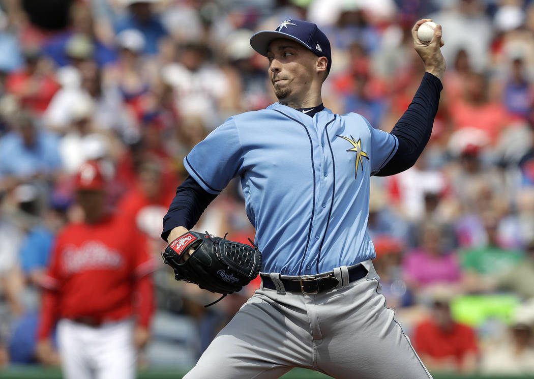 FILE - In this Monday, March 11, 2019, file photo, Tampa Bay Rays' Blake Snell pitches to the P ...