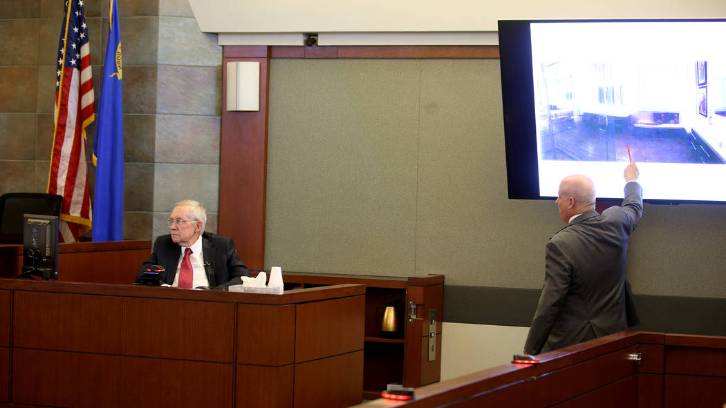 Former U.S. Sen. Harry Reid is questioned by attorney Laurin Quiat in the courtroom at the Regi ...