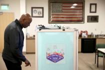 Rafiq Ali, of Las Vegas, votes at City Hall in downtown Las Vegas, Thursday, March 28, 2019. Fr ...