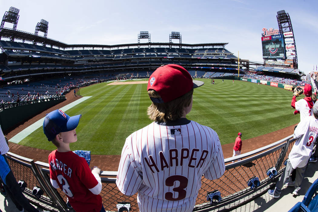 Philadelphia Phillies Bryce Harper fans watch batting practice ahead of first inning of the ope ...