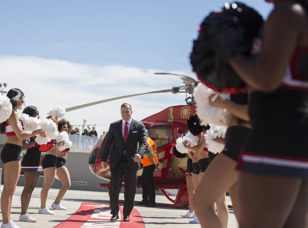 New UNLV men's basketball coach T.J. Otzelberger arrives in style at the Thomas & Mack Cent ...