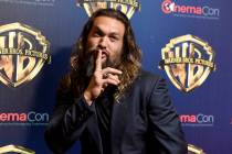 Jason Momoa, a cast member in the upcoming film "Aquaman," arrives at the Warner Bros ...