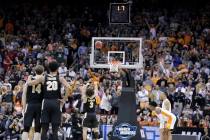 Purdue's Carsen Edwards shoots a free throw in the final seconds of the second half of a men's ...