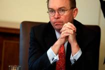 Acting White House chief of staff Mick Mulvaney listens as President Donald Trump speaks during ...