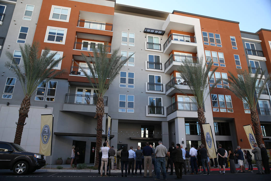 People attend the grand opening ceremony at Fremont9, a new apartment complex in downtown Las V ...