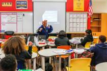 Students work in Jai Marin's eighth-grade literature class at Democracy Prep at Agassi Campus o ...