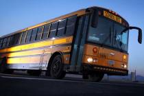 A Clark County School District bus leaves the Wallace Bus Yard in Henderson. (Jeff Scheid/Las V ...
