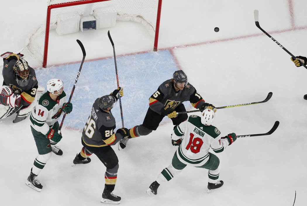 Minnesota Wild center Joel Eriksson Ek (14), Vegas Golden Knights center Paul Stastny (26), def ...