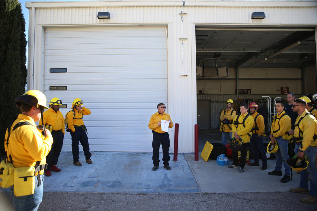 Students and firefighters attend a training session at Fire Station 80 in Blue Diamond, Saturda ...