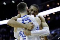 Kentucky's PJ Washington celebrates with teammate Tyler Herro near the end of a men's NCAA tour ...