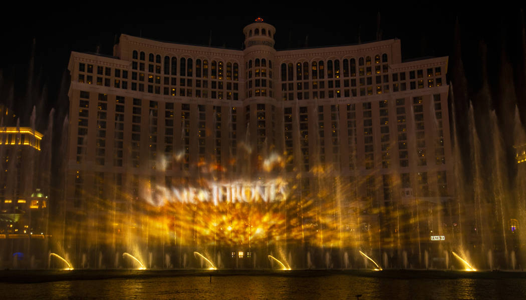 The logo is projected during the debut of the new water show based on ÒGame of Thrones&#xd ...