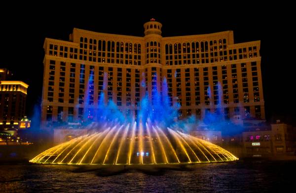 Blue flames erupt during the debut of the new water show based on "Game of Thrones" a ...