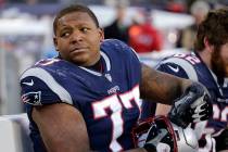 New England Patriots tackle Trent Brown sits on the sideline during a game against the Buffalo ...