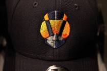 The Las Vegas Aviators logo is on hats for sale within the sales office in Downtown Summerlin a ...