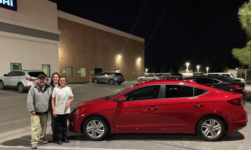 Diana Medina is seen with her parents, Daniel and Dora Medina, in front of the 2019 Elantra she ...