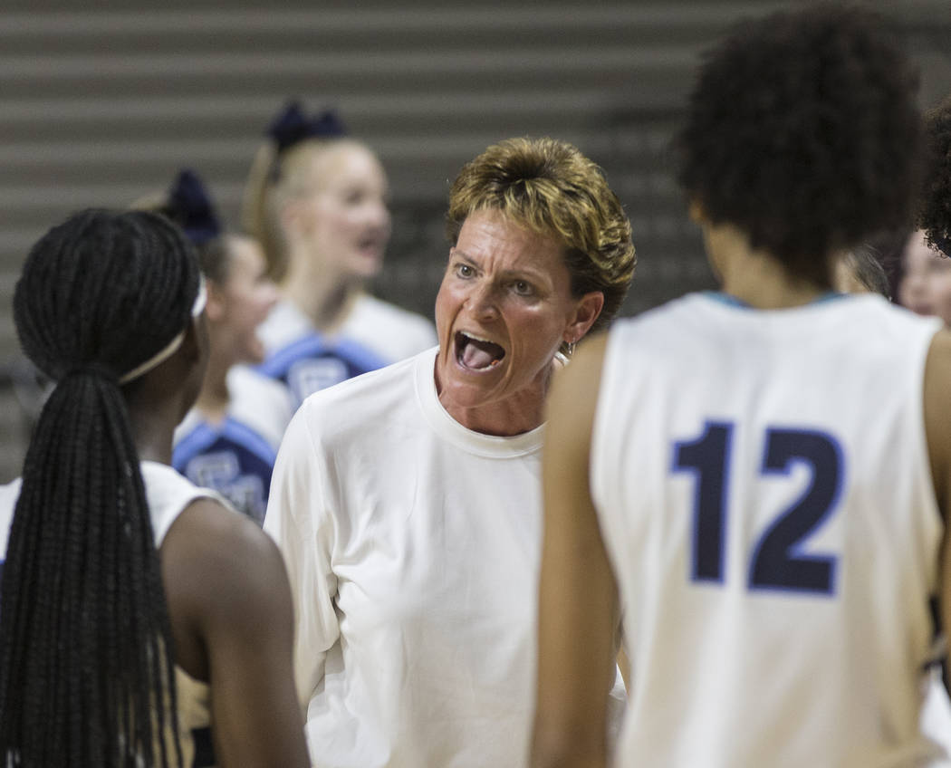 Centennial head coach Karen Weitz fires up her team in the first quarter during the Bulldogs Cl ...