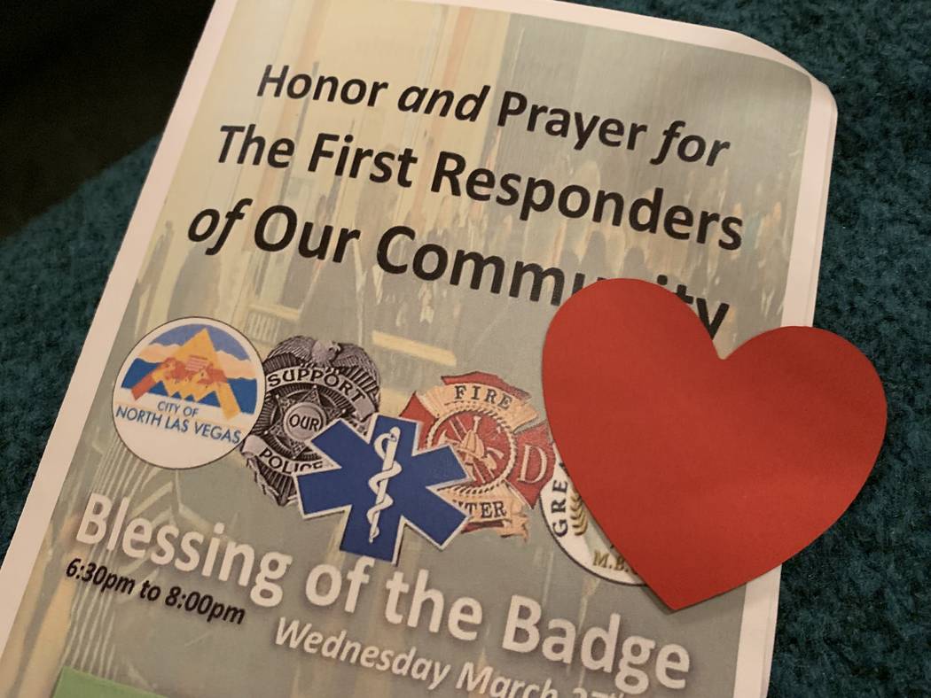 Before the ceremony, ushers at Greater Evergreen Missionary Baptist Church handed out programs ...