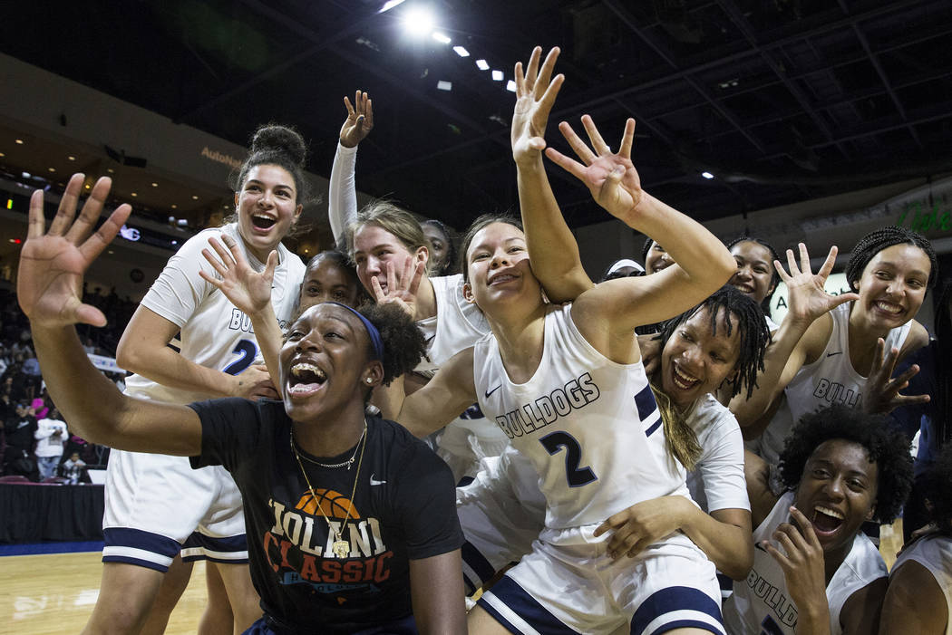 Centennial celebrates after beating Bishop Gorman 78-47 to win the Class 4A girls state champio ...