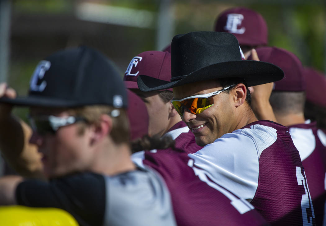 Faith Lutheran's Frank Pagano (24) sports a cowboy hat in their dugout versus Palo Verde during ...