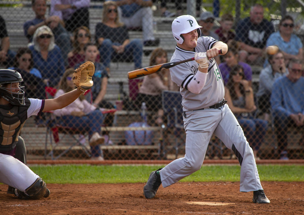 Palo Verde's Hunter Chynoweth (15) eyes another ball from a Faith Lutheran pitcher during their ...