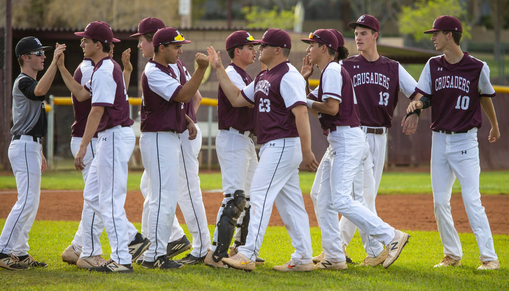 Faith Lutheran players celebrate their win over Palo Verde during their high school baseball ga ...