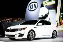 A 2014 Kia Optima is unveiled March 27, 2013, during the 2013 New York International Auto Show ...