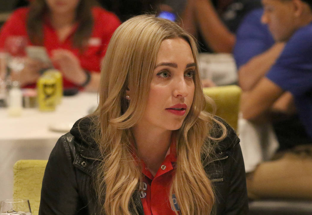 NHRA racer Brittany Force listens to reporters questions during a press conference on Thursday, ...