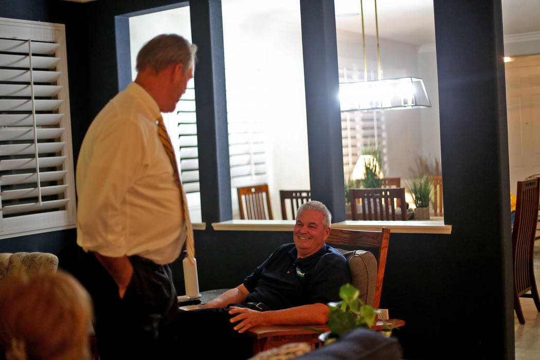 North Las Vegas Mayor John Lee speaks to George Warner, candidate for Ward 4 for North Las Vega ...