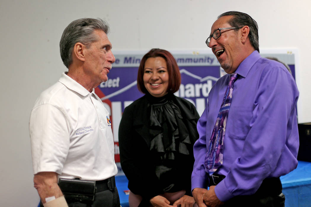 Councilman Richard Cherchio, left, speaks to Eddie Escobedo next to Mary Valadez at Cherchio's ...