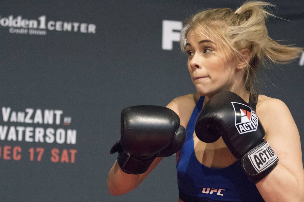 Paige VanZant eyes where her next punch will land while hitting mitts during the UFC on Fox 22 ...