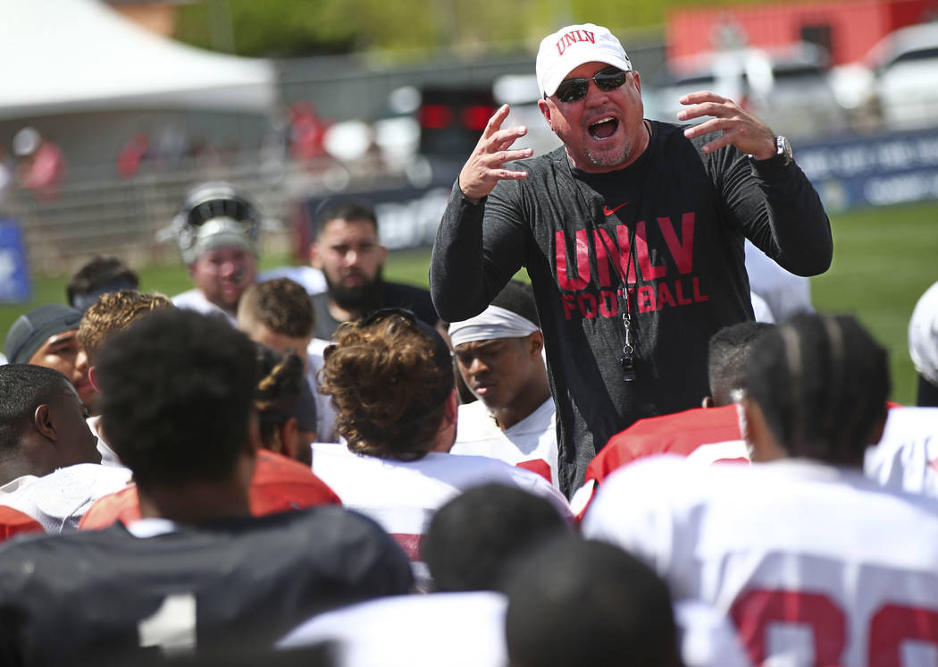 UNLV Rebels head coach Tony Sanchez talks with his team after the spring football game at Pete ...