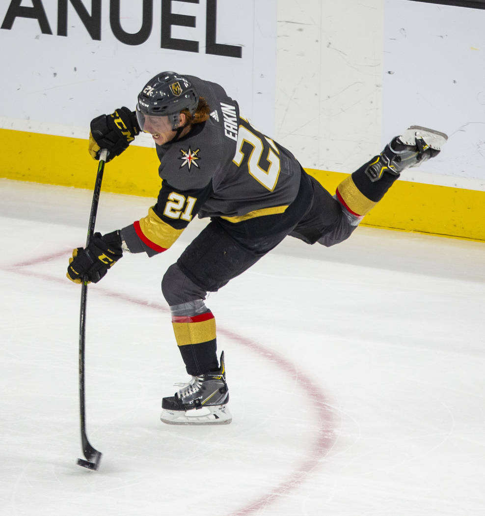 Vegas Golden Knights center Cody Eakin (21) fires a shot into the goal over the Edmonton Oilers ...