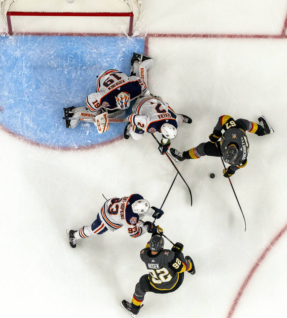 Vegas Golden Knights left wing Max Pacioretty (67) eyes a puck near the Edmond Oilers goal duri ...