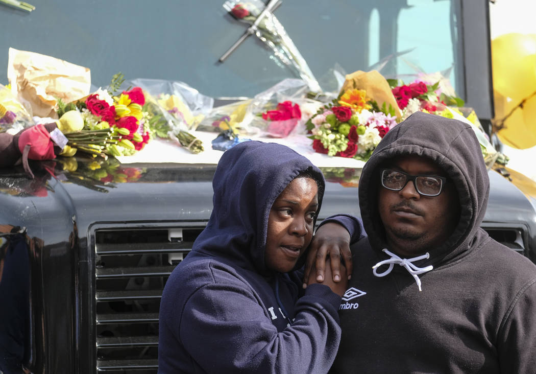 Fans of rapper Nipsey Hussle mourn his death at a makeshift memorial on the parking lot of the ...