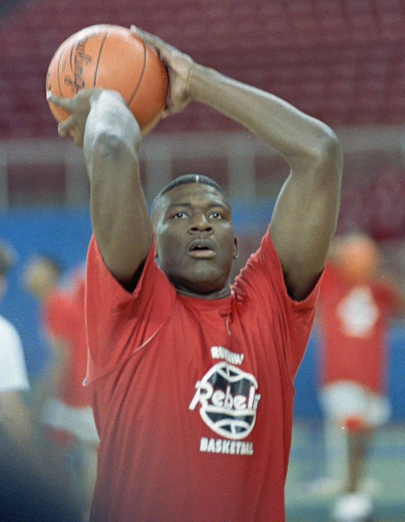 UNLV's Larry Johnson works out with teammates in Seattle in preparation for the game against Ut ...