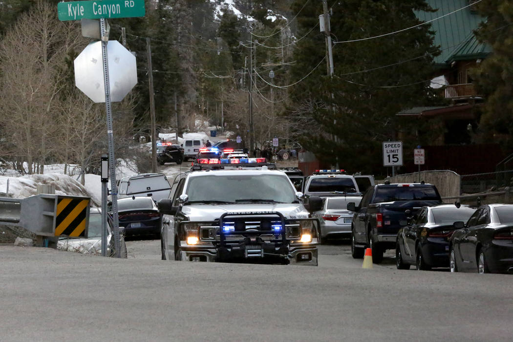 Police investigate a shooting involving Nevada Highway Patrol troopers Tuesday, April 2, 2019, ...