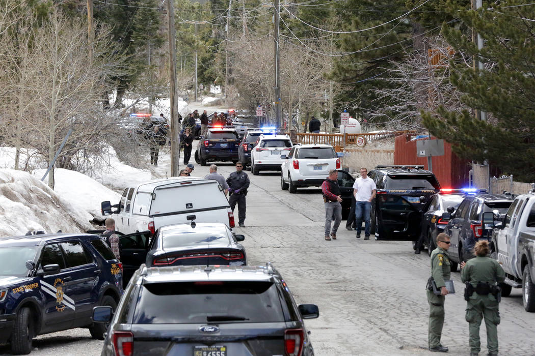 Police investigate a shooting involving Nevada Highway Patrol troopers Tuesday, April 2, 2019, ...