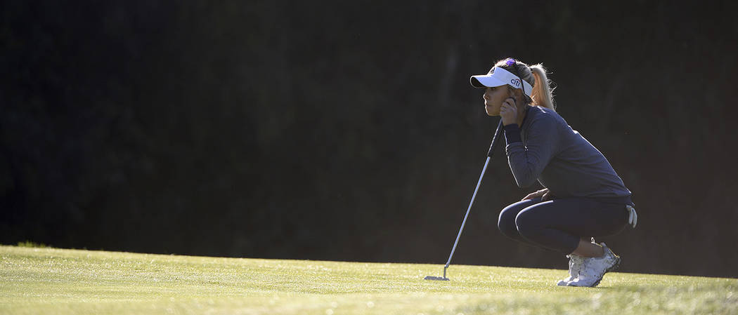 Danielle Kang lines up a putt on the 12th green during the first round of the Kia Classic LPGA ...