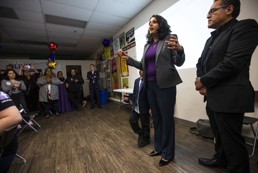 Former assemblywoman Olivia Diaz, a Las Vegas City Council candidate for Ward 3, center right, ...