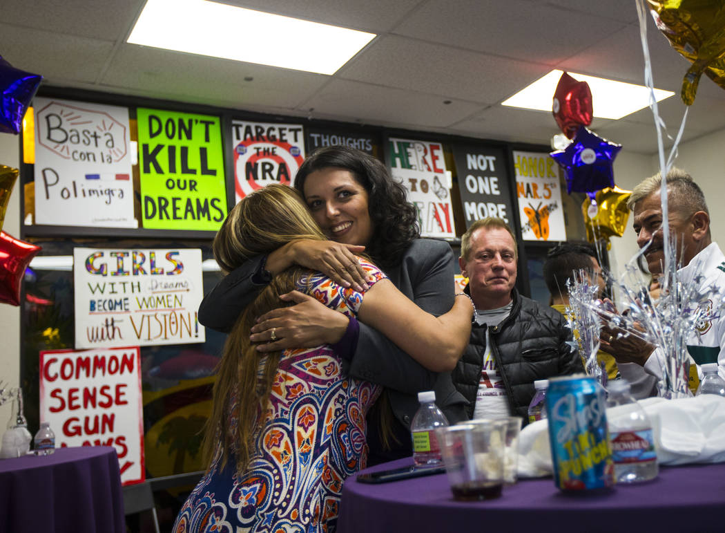 Areli Sanchez, left, hugs former assemblywoman Olivia Diaz, a Las Vegas City Council candidate ...