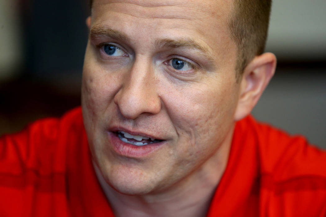 New UNLV basketball coach T.J. Otzelberger talks to a reporter in his office at the Thomas & ...