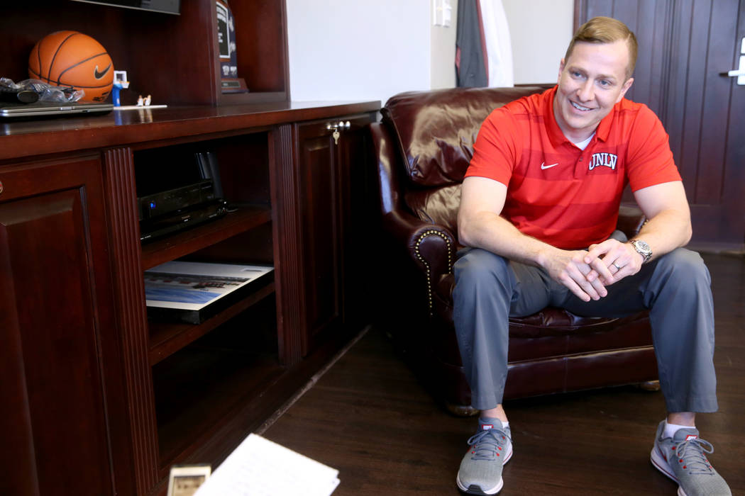 New UNLV basketball coach T.J. Otzelberger talks to a reporter in his office at the Thomas & ...