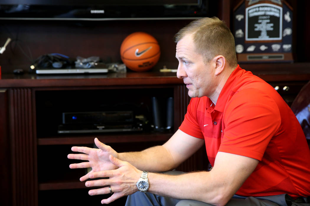 New UNLV basketball coach T.J. Otzelberger talks to a reporter in his office at the Thomas &amp ...